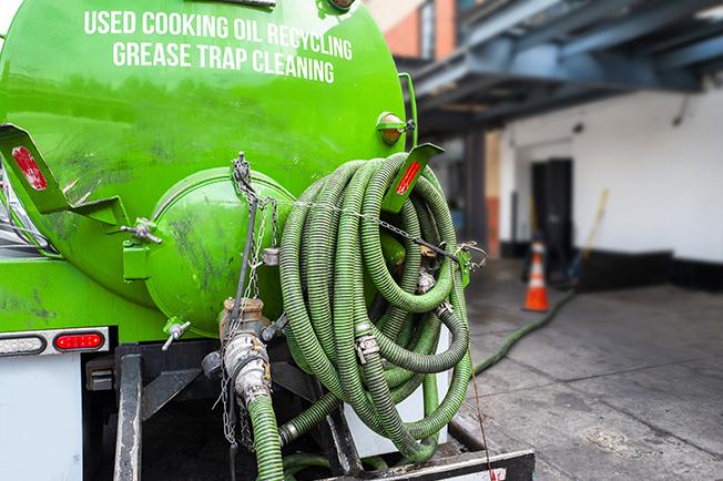 workers at Grease Trap Cleaning of Lancaster